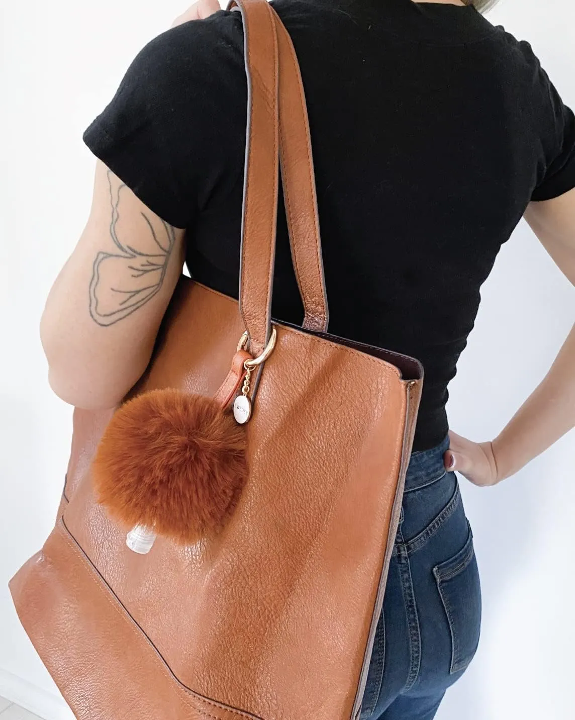 Faux Fur Fluffy large Pom Pom Keychain cosmetic bottle holder. Refillable. Clips on any Backpack or Purse.