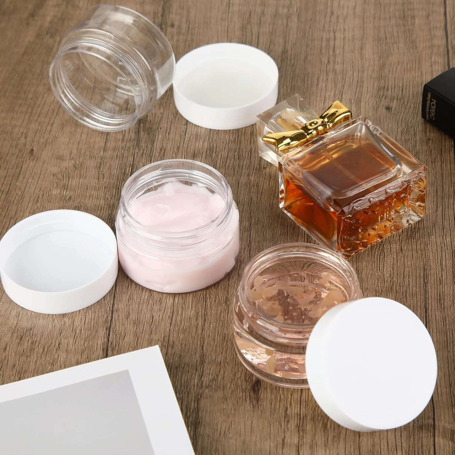 SATINIOR 100 Pcs Plastic Jars with Lids Small Containers Lids Wide Mouth Small Plastic Containers for Lotion Cream Rhinestones Body Butters Travel Storage(2 oz,Clear with White Lid)