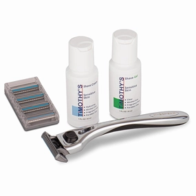 Timothy's Shaving starter kit with one precision re-useable handle, four cartridges, a one bottle of concentrated shave cream, a one ounce bottle of concentrated shave gel, one travel guard for razor